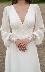 A-Line Floor Chiffon Long Sleeve Wedding Dress with Sequins and Train